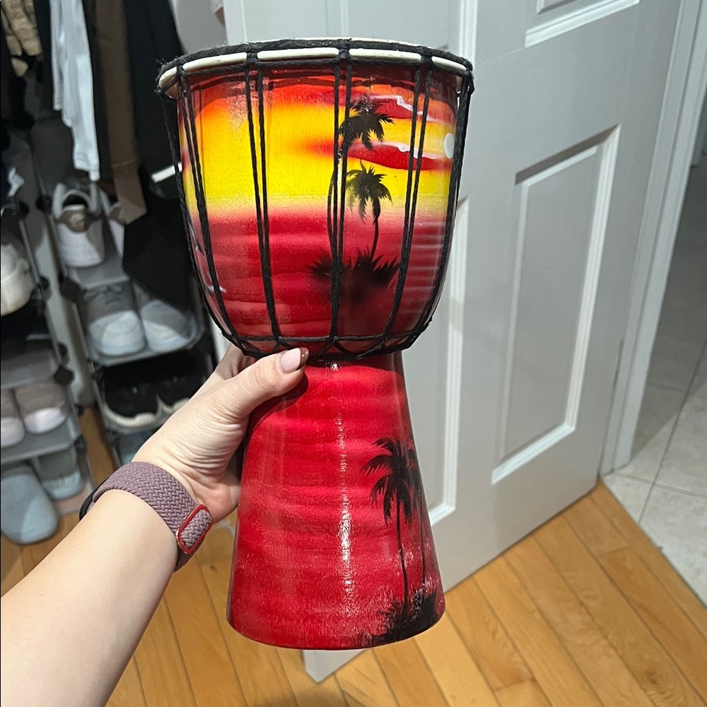 Vibrant Red Djembe Drum with Sunset Design